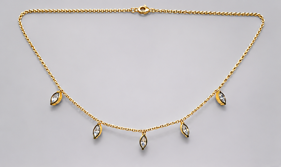SEELE gold-tone chain necklace with five dangling marquise-cut clear crystal charms, full front view.