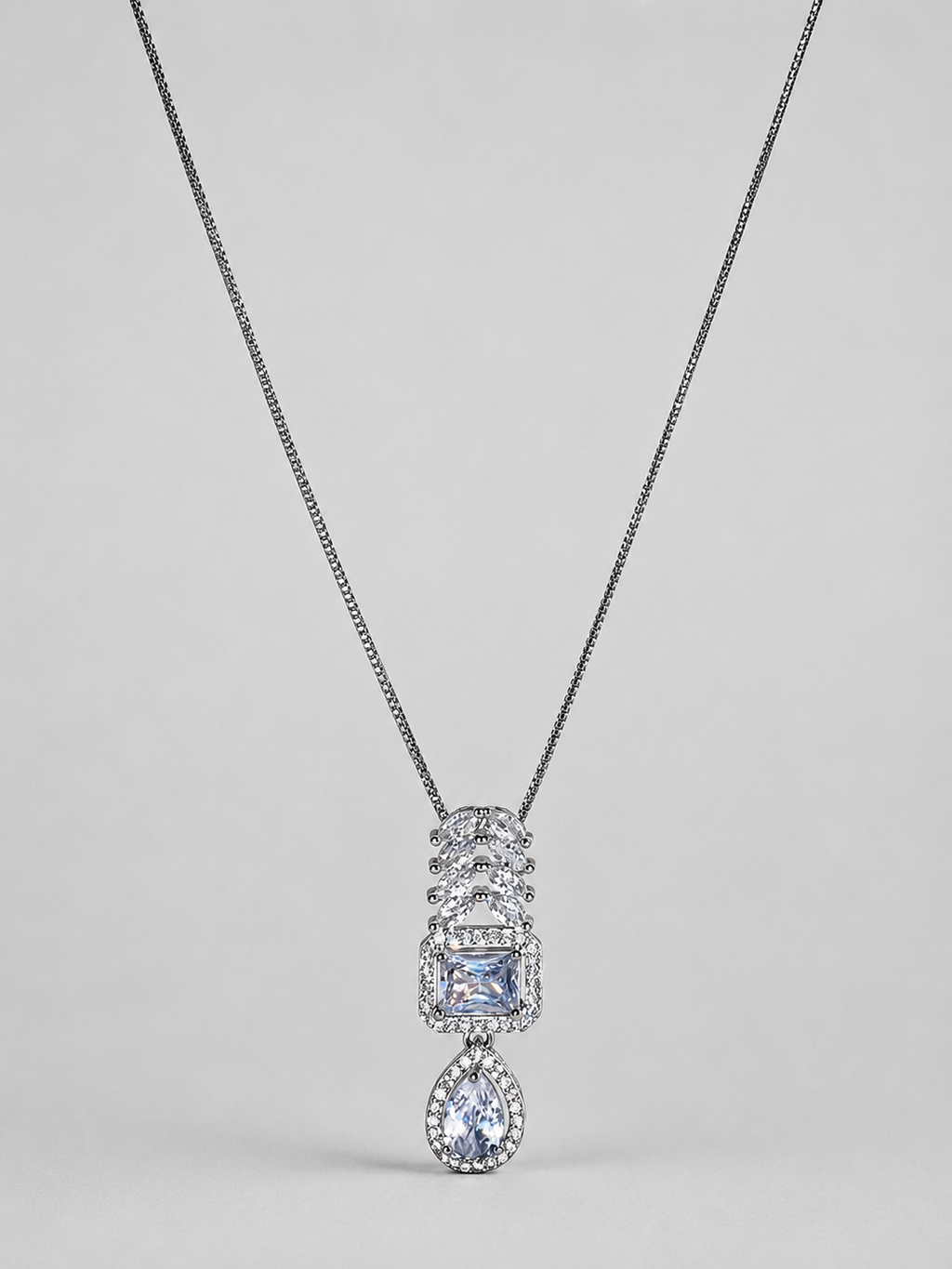 SEELE elegant crystal cascade pendant necklace with rectangular center and pear-shaped drop