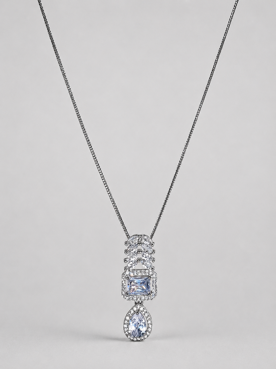 SEELE elegant crystal cascade pendant necklace with rectangular center and pear-shaped drop