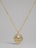 A gold filigree pendant necklace featuring a central white pearl, displayed against a neutral gray background.