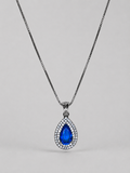 Royal blue teardrop crystal pendant necklace with sparkling clear stones and a silver-tone setting on a delicate chain.