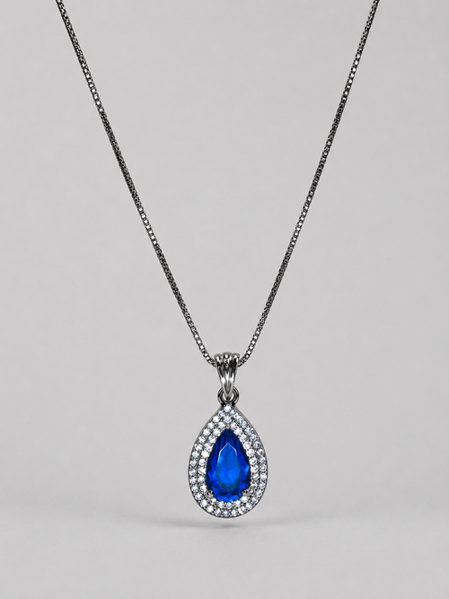 Royal blue teardrop crystal pendant necklace with sparkling clear stones and a silver-tone setting on a delicate chain.