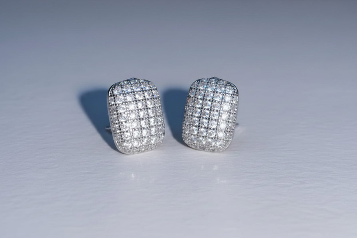 Silver rectangular crystal-studed earrings with sparkling rhinestone finish.  