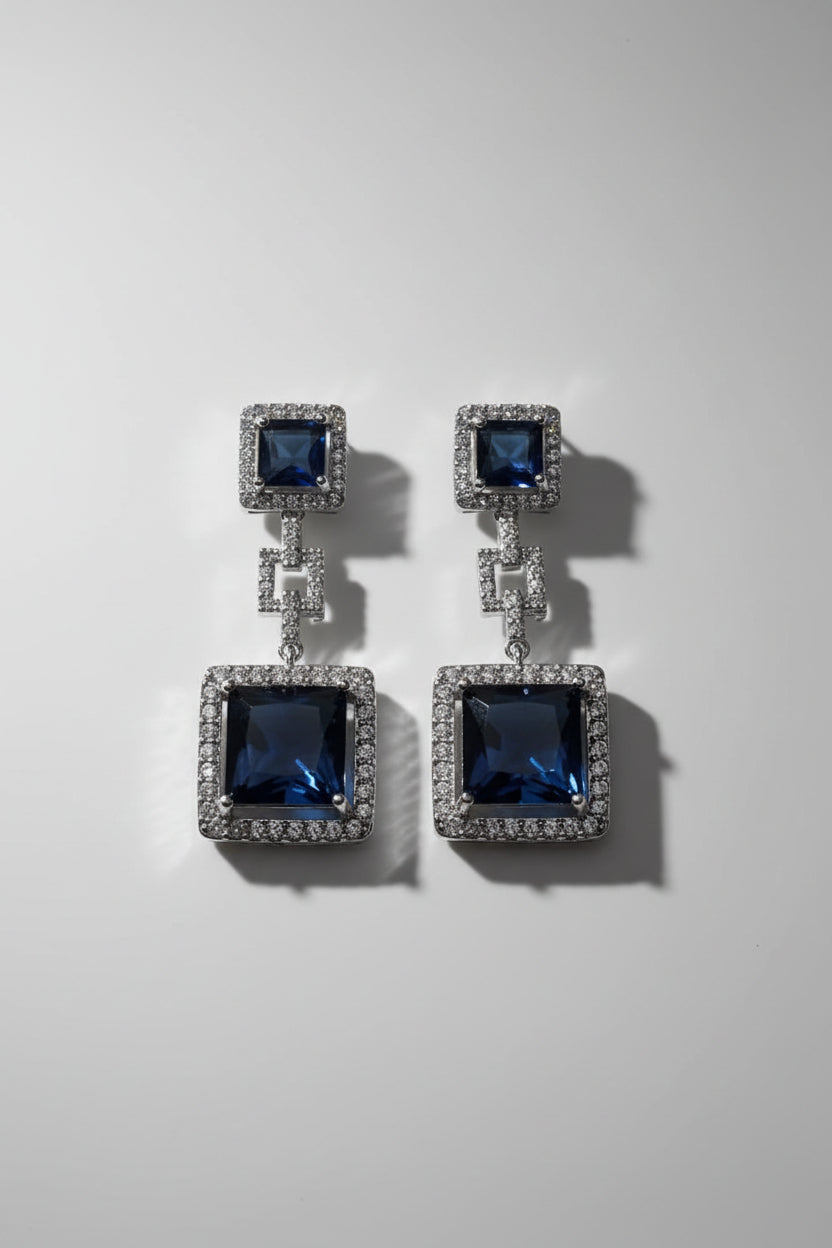 SEELE Midnight Cascade Drop Earrings,  deep blue princess-cut zircon drops with pavé frames on silver base